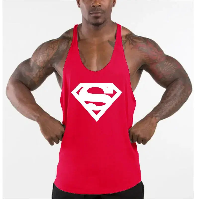 Men's bodybuilding fitness apparel featuring a red tank top with a superman logo, showcasing fitness style.