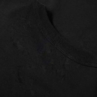 Close-up view of the neckline of a black Stand T-Shirt for Men Graphic T Shirts Tops, showcasing the fabric texture.