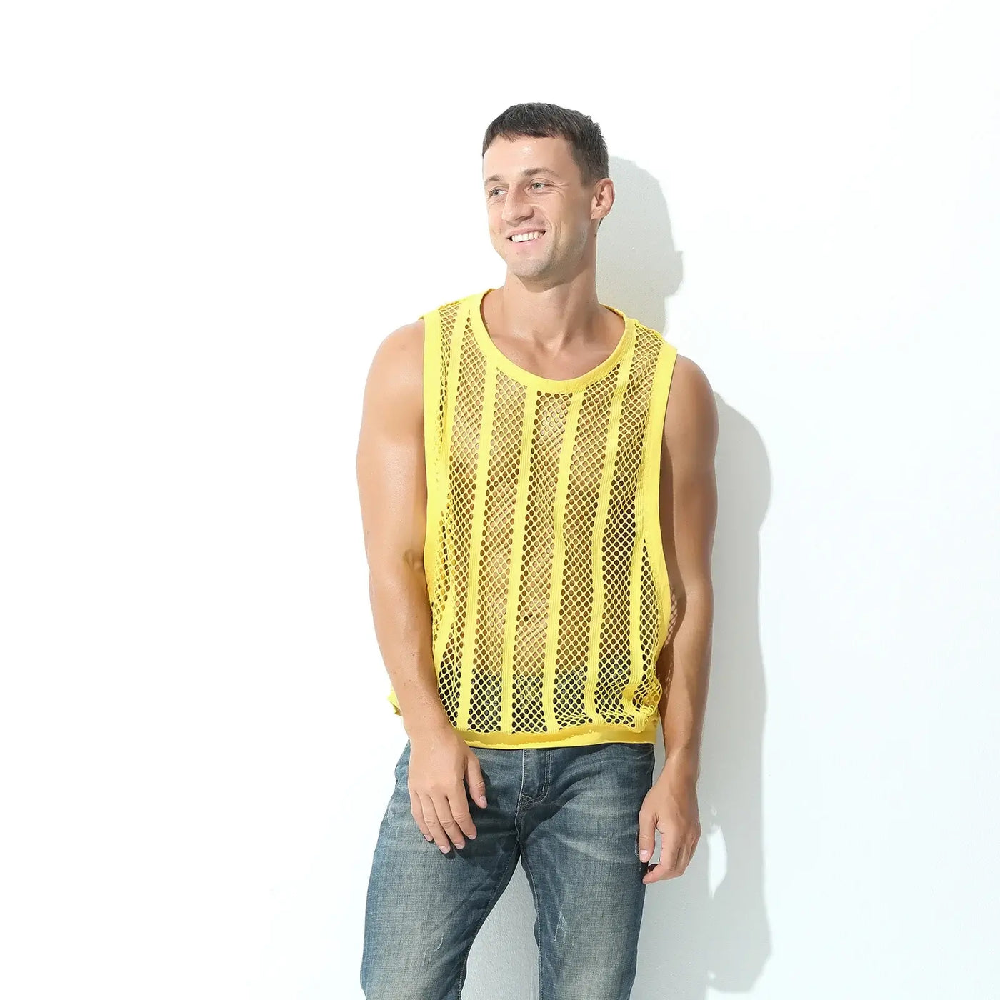 Men Tank Top Sleeveless Undershirt in yellow mesh worn by a man, perfect for spring and summer casual wear.